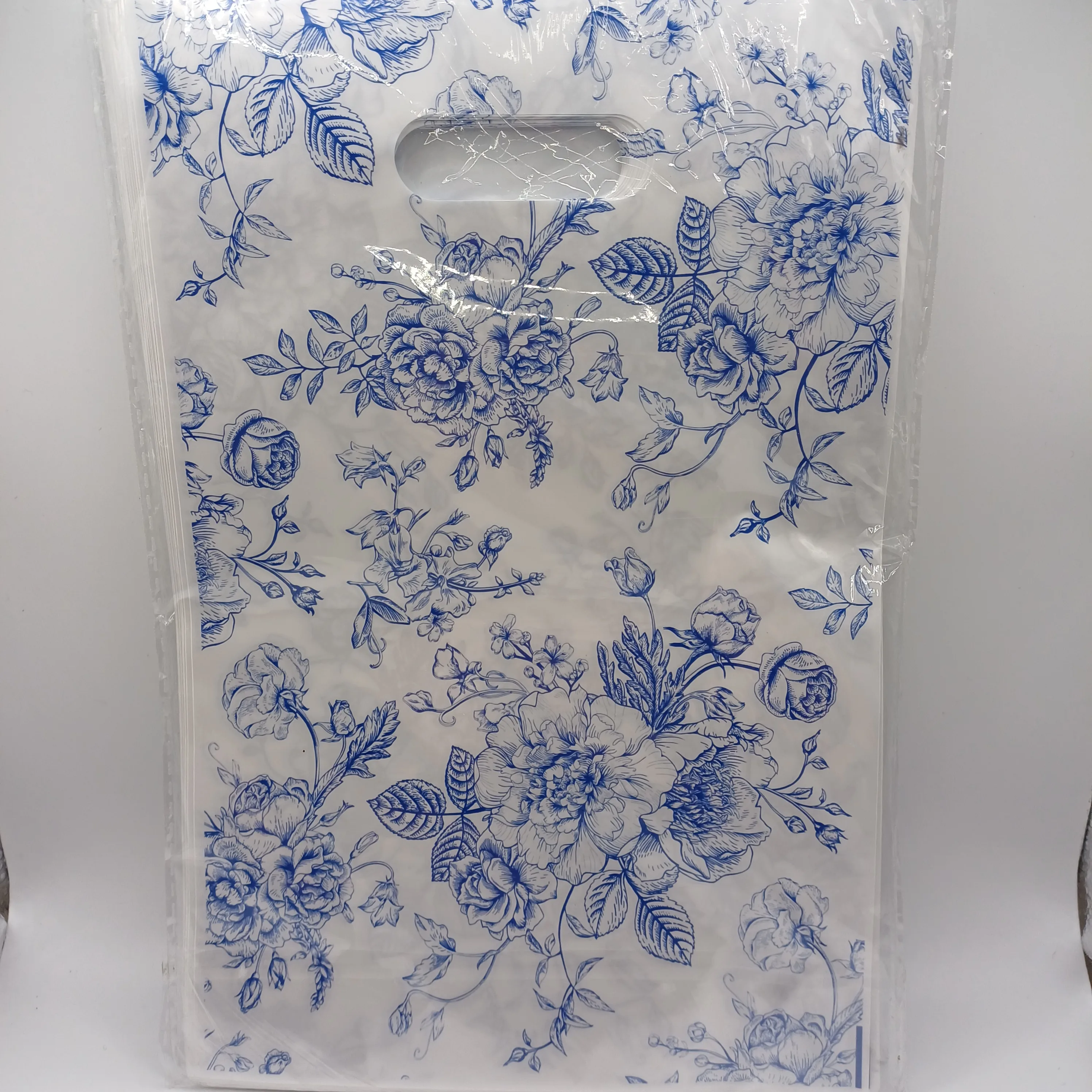 Sac blanc avec rose bleue