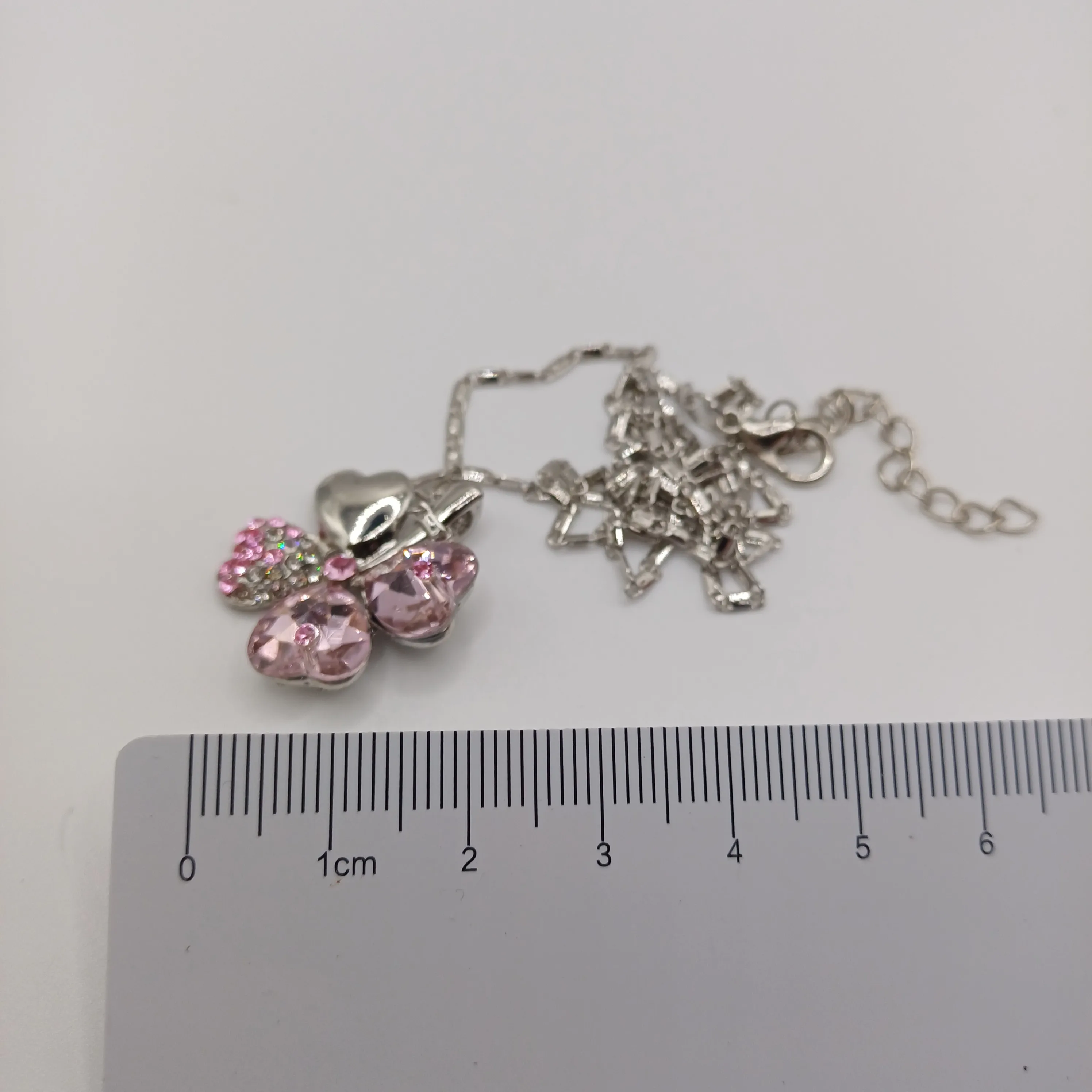 Pendentif fantaisie trèfle rose