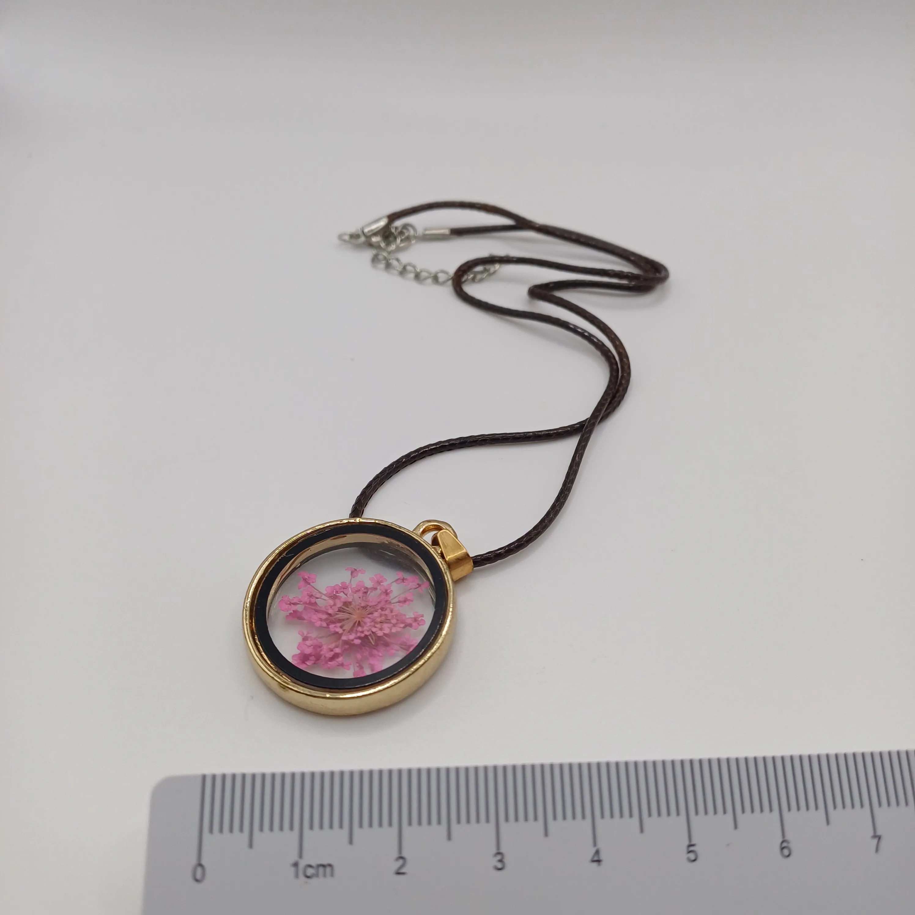 Collier fleurs rose