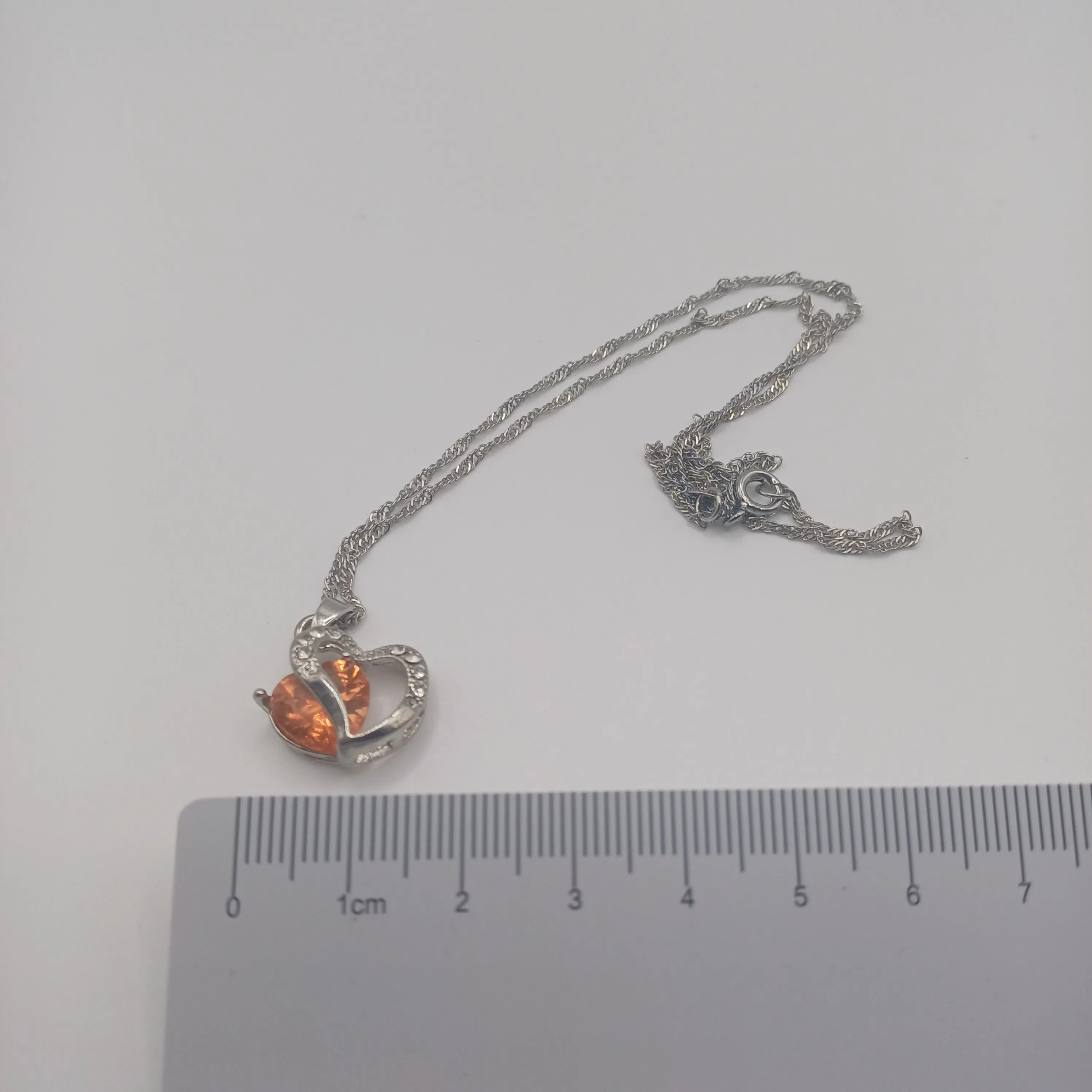 Pendentif fantaisie coeur argent/cuivre