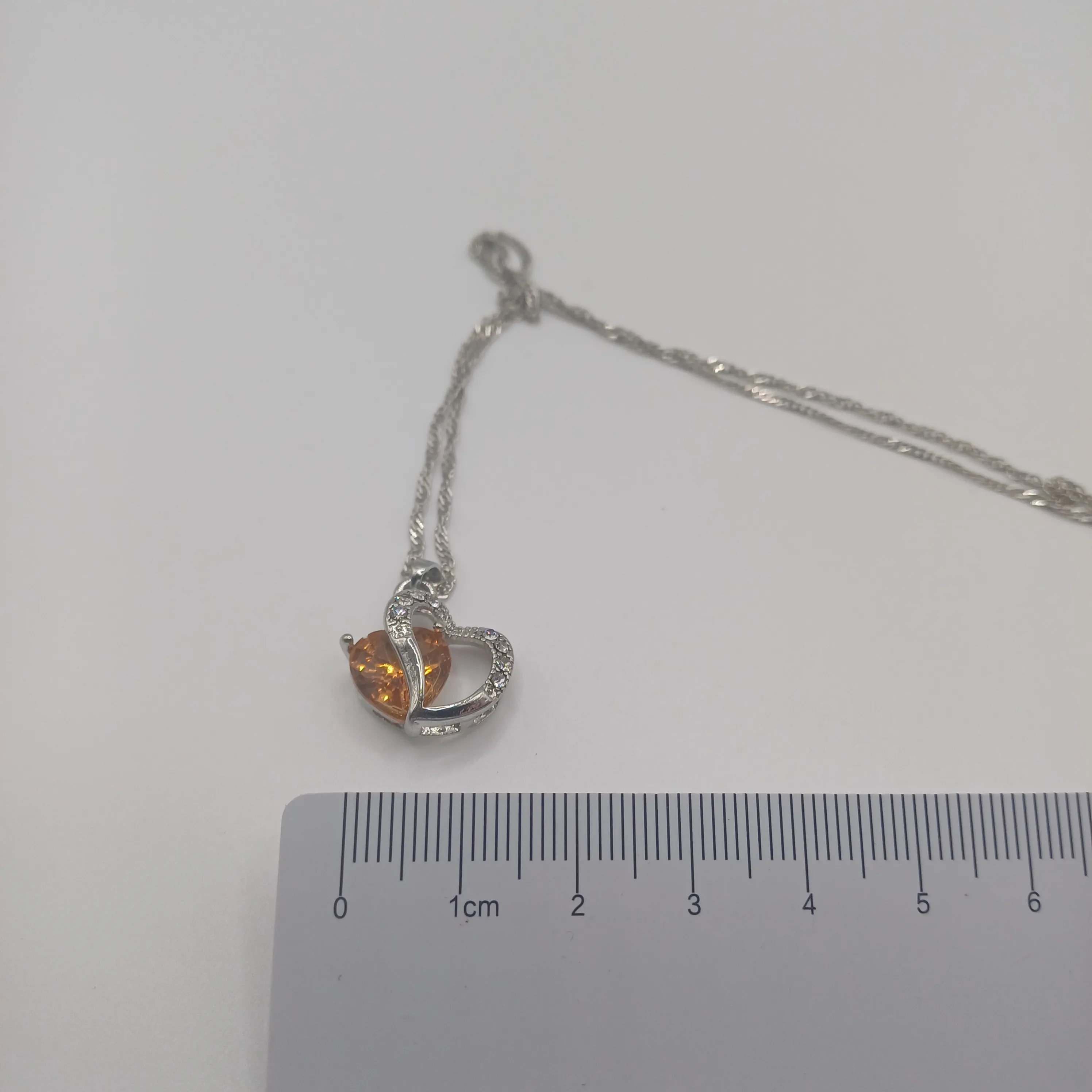 Pendentif fantaisie coeur argent/ambre