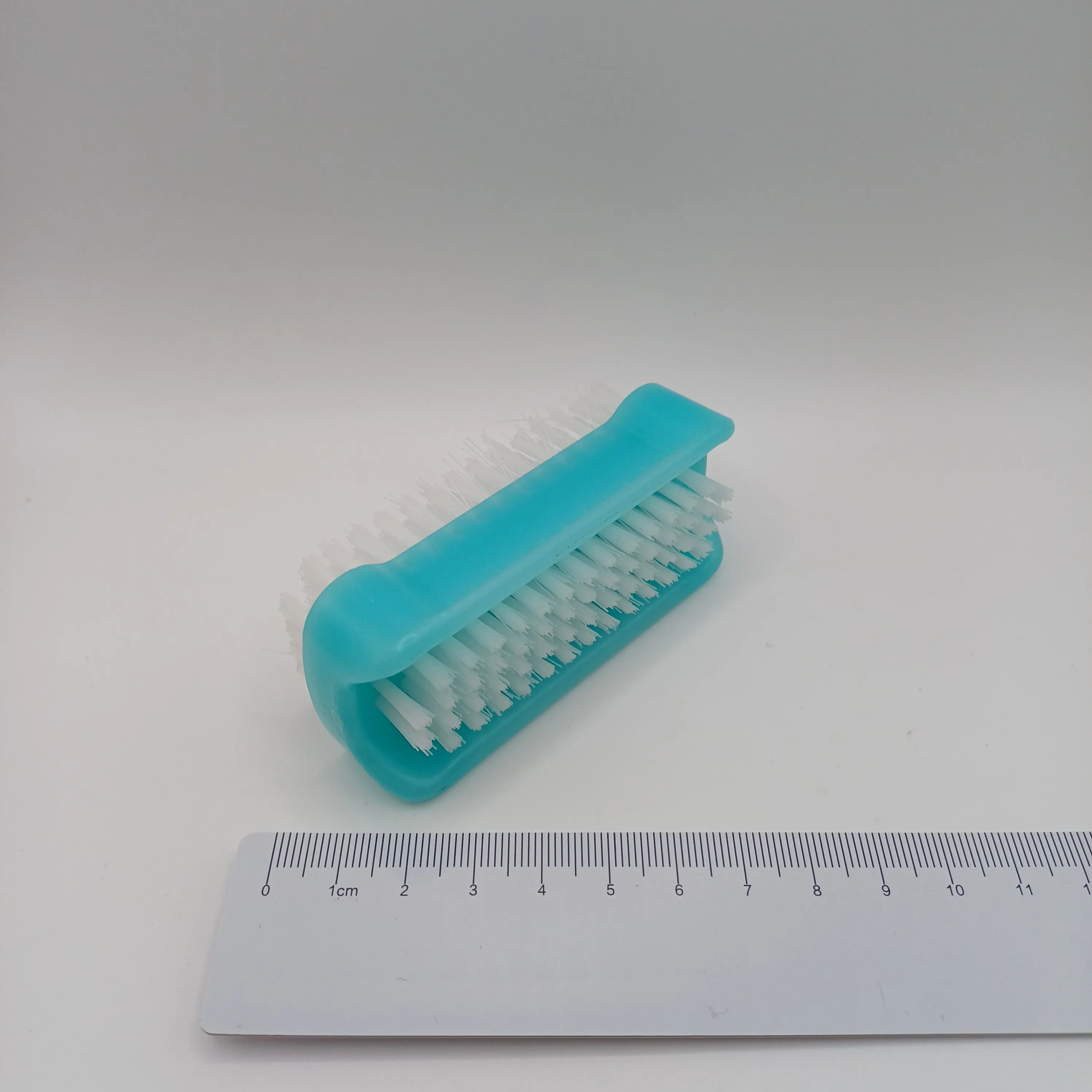 Brosse à ongles bleue double face