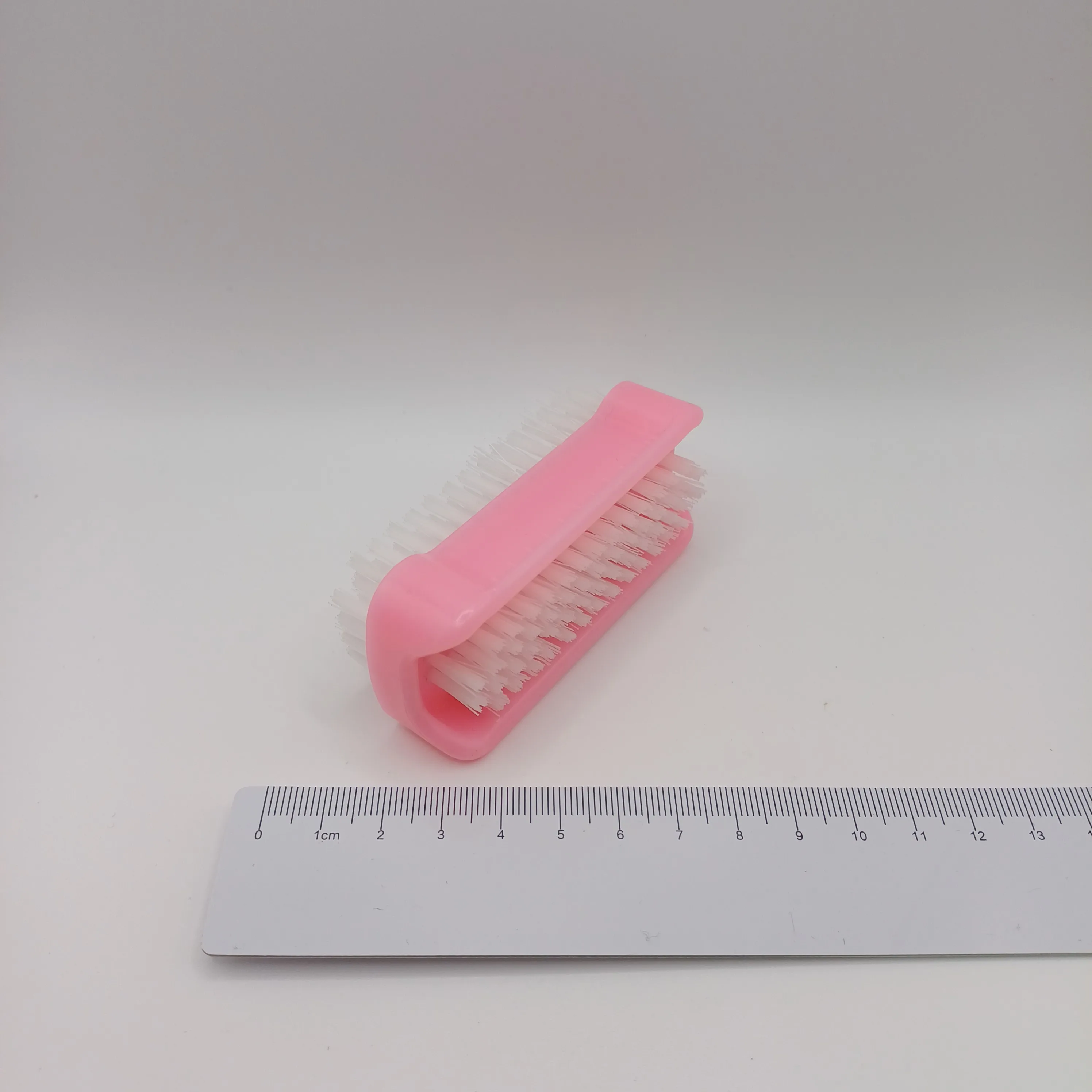 Brosse à ongles rose double face